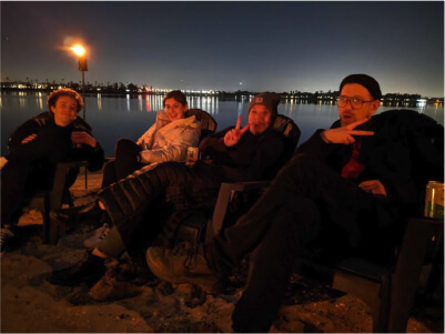 late night beach bonfire with teammates